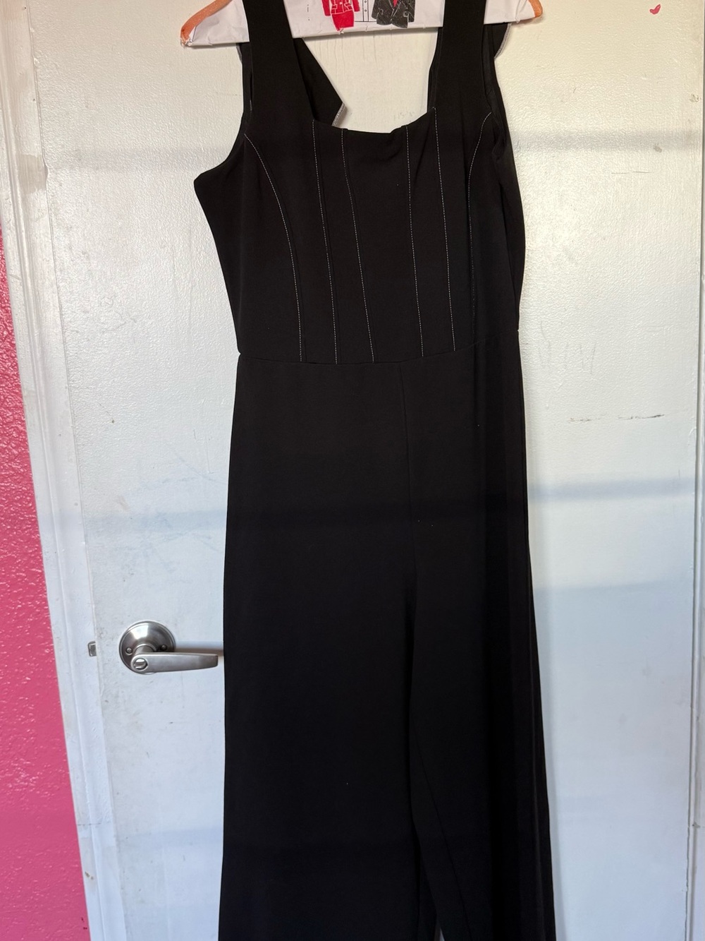 BEBE Black Sleeveless Jumpsuit with Paneled Bodice